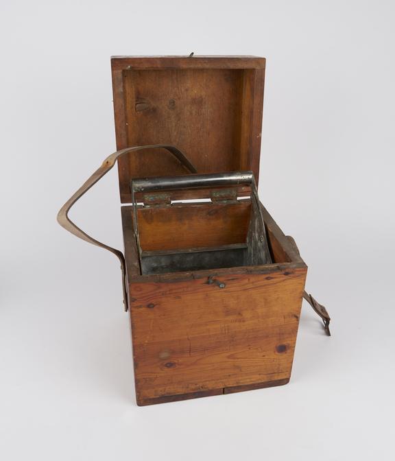 Wooden case with rectangular bucket of messengers, assorted