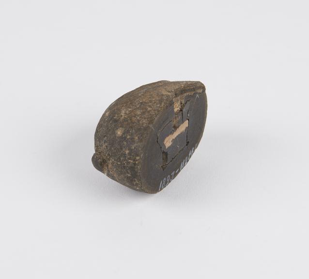 Sectioned manganese nodule collected by HMS Challenger, 1875