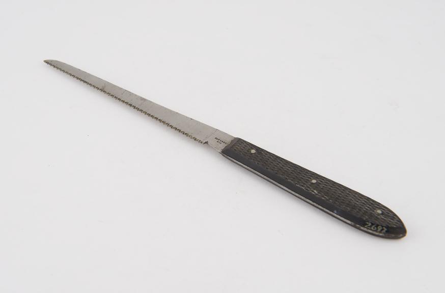 Finger saw, steel and ebony, by Savigny and Co