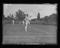 Fred Perry plays lawn tennis