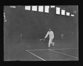 Fred Perry on the tennis court