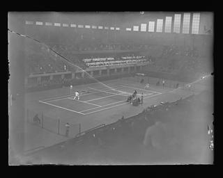 Fred Perry on the tennis court