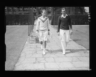 Fred Perry at walking to tennis court
