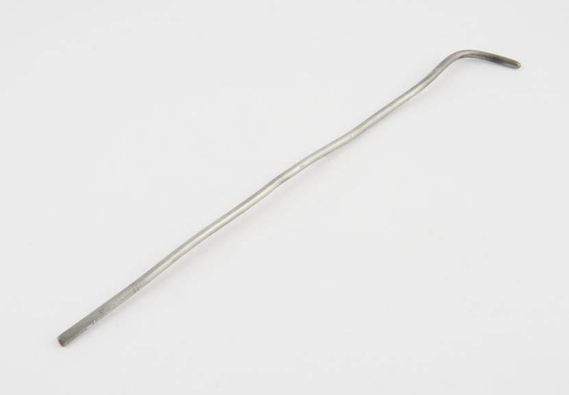 Cylindrical urethral sound with sharp proximal curve, lead