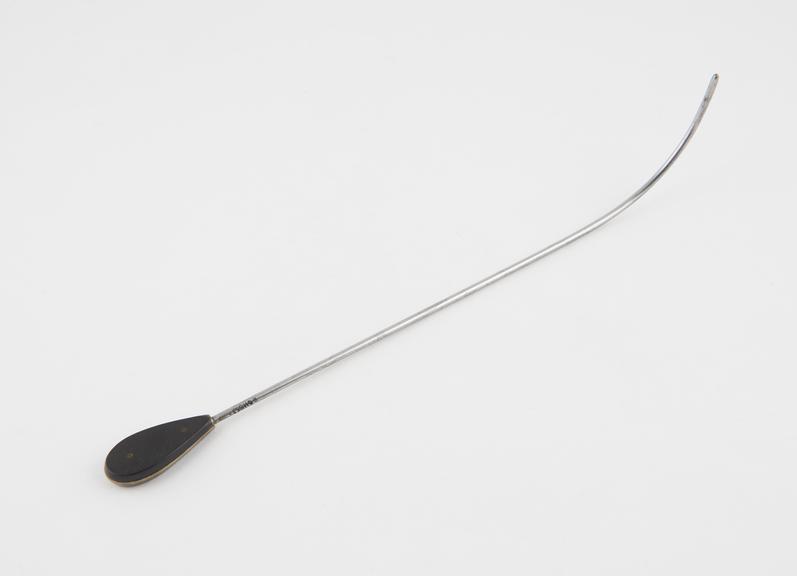 Urethral sound, with long proximal curve, and ebony handle