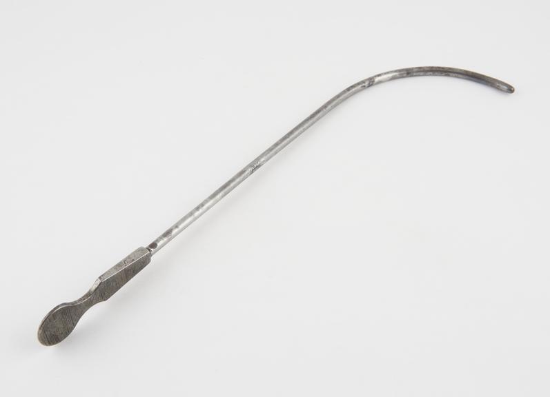 Prostatic urethral sound with long proximal curve and flat