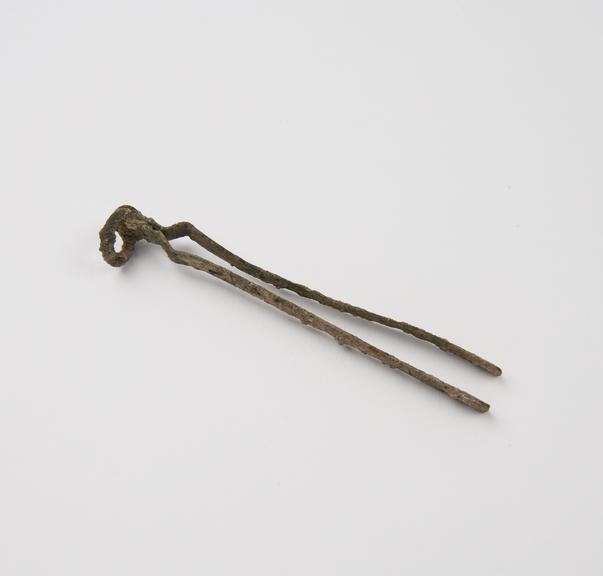 Bronze forceps, with ring handle, excavated from the Tiber