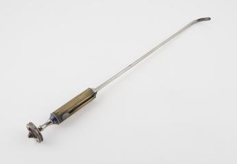 Small Thompson's lithotrite with flat-ended proximal curve and cylindrical handle with wheel