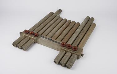 Rocket chamber and nozzles for a rocket assisted ejection seat