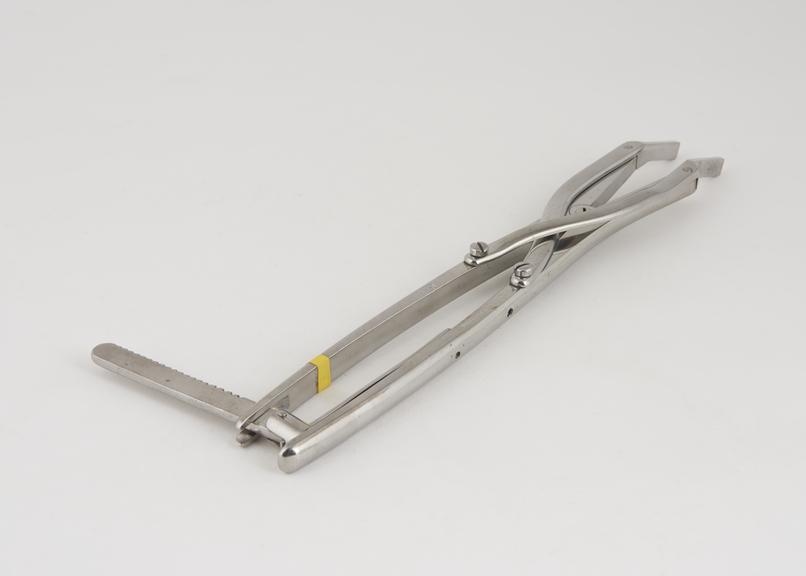 Extension arm from surgical instrument set designed by Henry