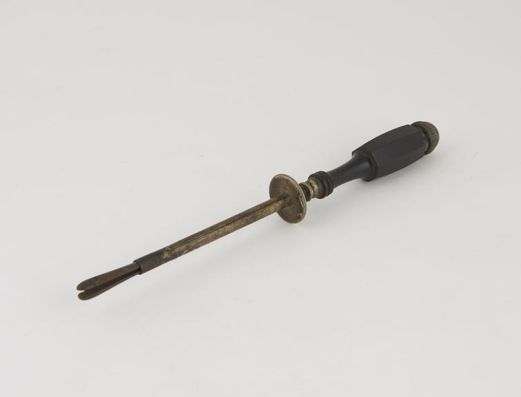 Needle holder with wooden handle