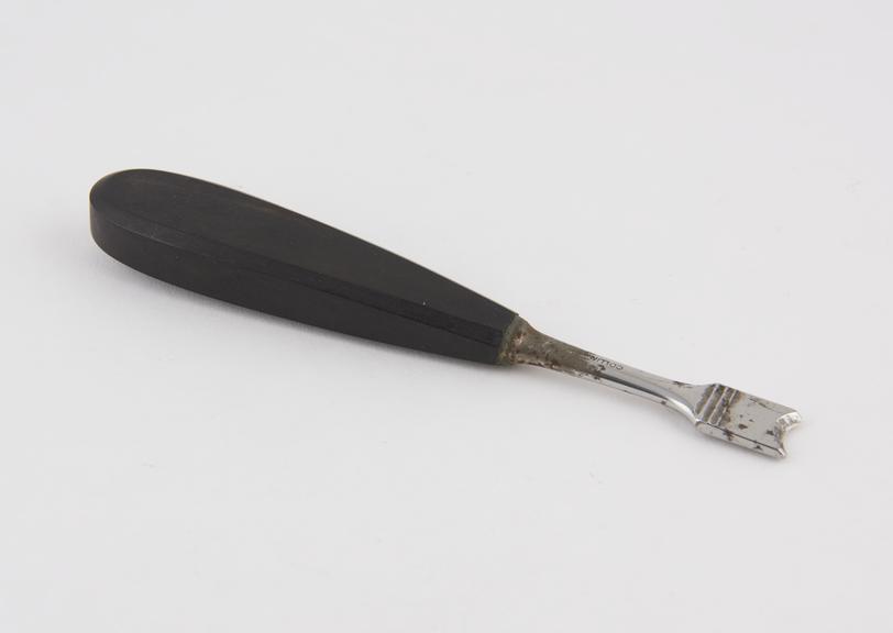 Ollier's concave rugine, steel with ebony handle, by Collin