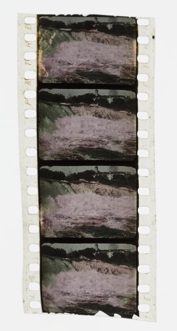 Four frames of silent 35mm positive Pathecolor film showing a