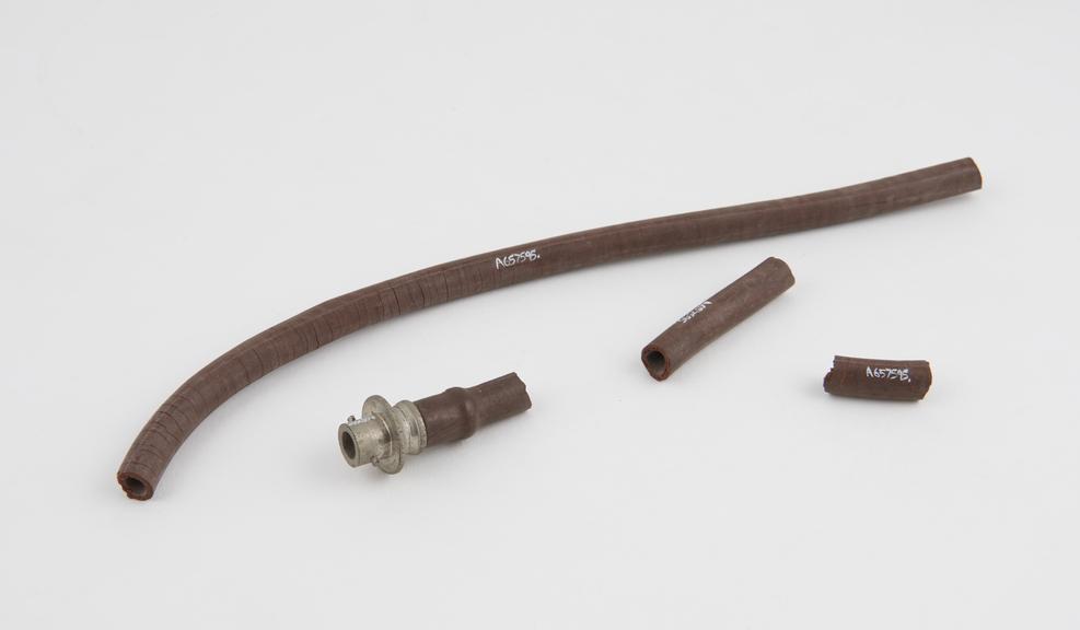 Tubing, rubber, with steel head, 1880-1920