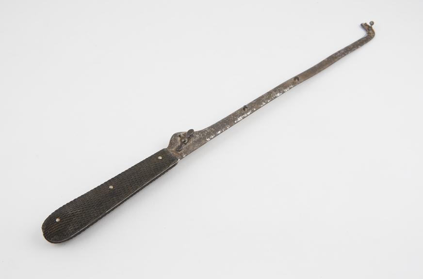 Saw, chain, metal and ebony, French, mid-19th century