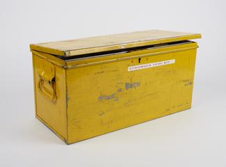 Box containing tools for maintaining Strowger telephone switching equipment, with maintenance engineer’s inspection lamp and portable test telephone
