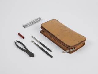Zip fastened leather pouch