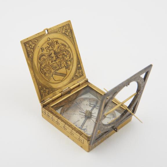 Sundial, made as a locket, gilt metal, part silver