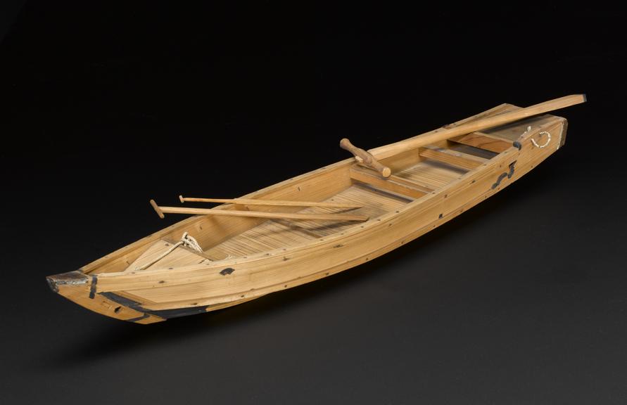 Model of a Japanese trading junk, with dinghy