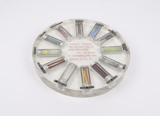 12 BEPO irradiated material samples, mounted in perspex disc
