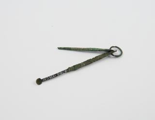 2 bronze toilet implements on ring, Roman