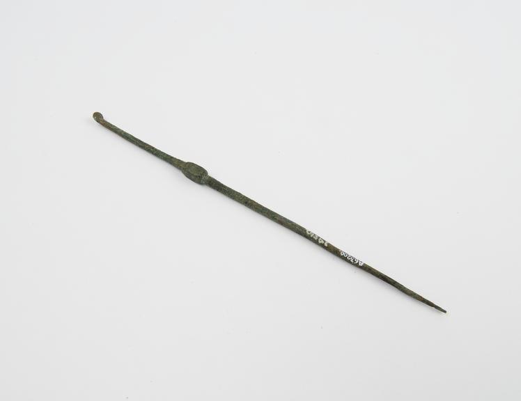 Combined probe and scoop, bronze, Hamonic collection