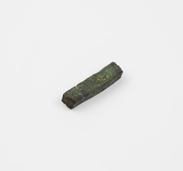 Short bronze bar, broken off at both ends, Roman