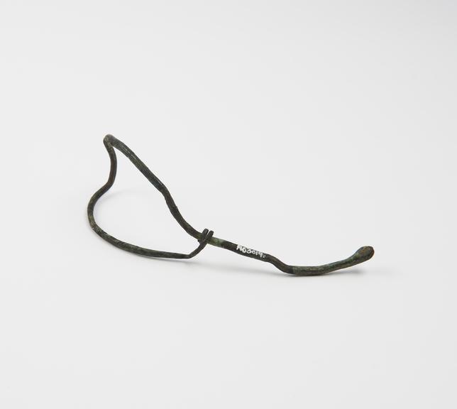 Tongue depressor, bronze wire, with serpent head decoration