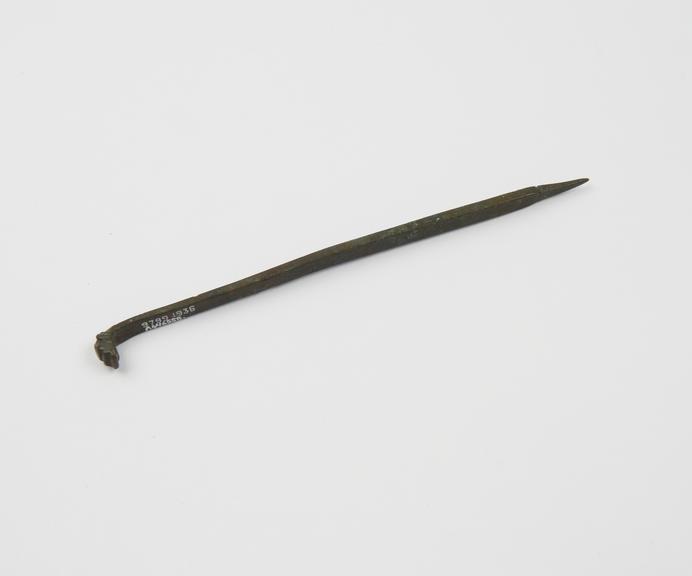 Unidentified pointed bronze instrument with decorated head