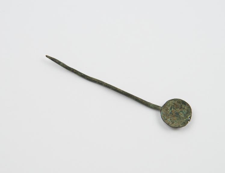 Bronze spoon, with circular bowl and pointed stem, Roman type