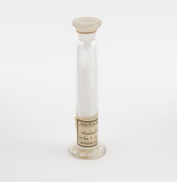 Glass specimen jar containing Acetal dibenzoique de la