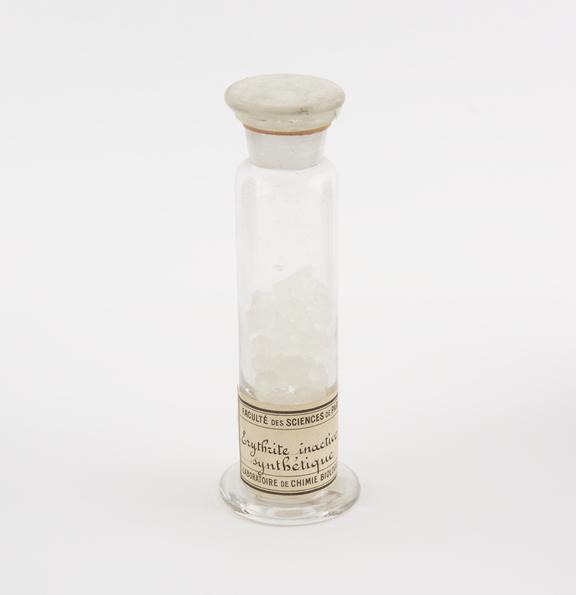 Glass specimen jar containing Erythrite inactif synthetique