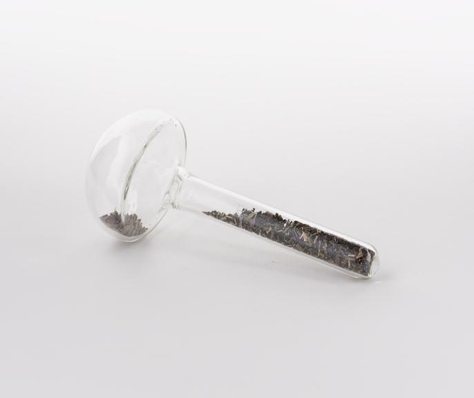 Mushroom shaped glass vial containing lanthanum