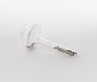 Mushroom shaped glass vial containing gadolinium