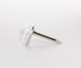 Mushroom shaped glass vial containing caesium