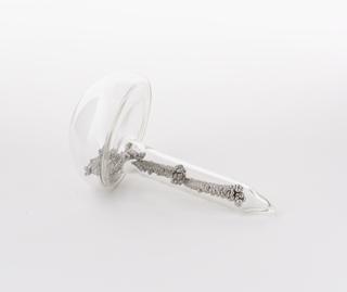 Mushroom shaped glass vial containing cobalt