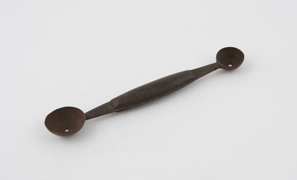 Bone scoop(?), double-headed, metal and wood