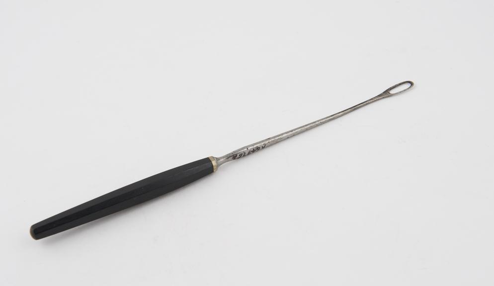 Curette, steel and ebony, by Mayer and Meltzer of London