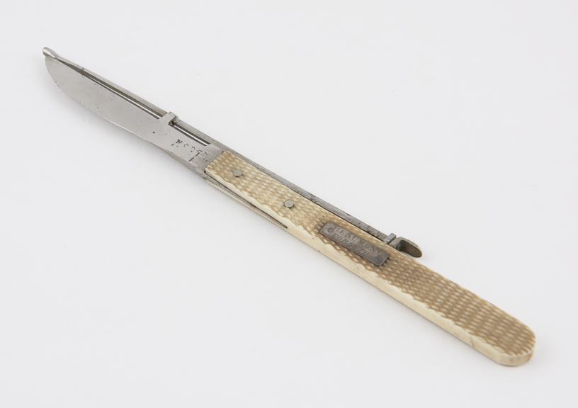 Knife, steel and ivory, sliding probe tip