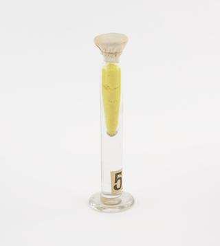 Glass jar containing fluorenone