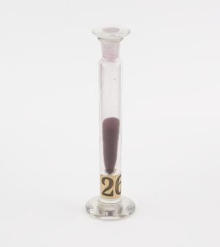 Glass specimen jar containing pararosaniline base