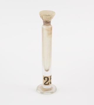 Glass jar containing Aniline Blue