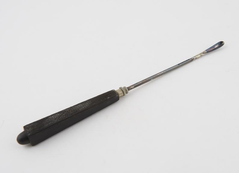 Curette, steel shaft, ebony handle, European, late 19th century