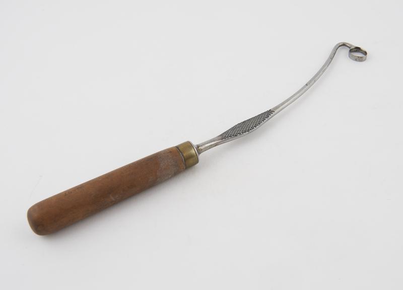 Curette, metal and wood, by Hawnsley, English