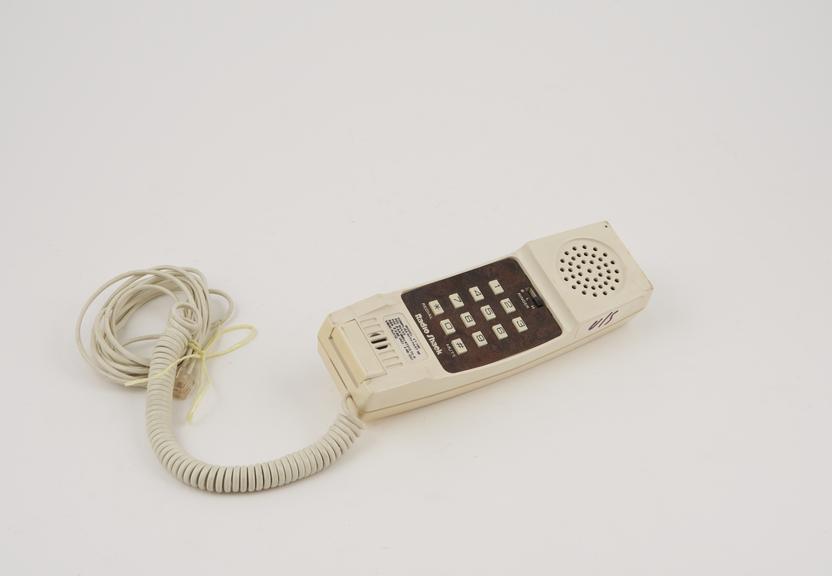 Telephone one piece compact handset, push button, cream