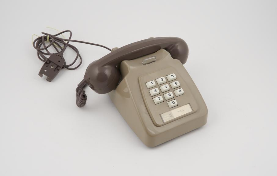 Telephone handset, two tone grey, push-button