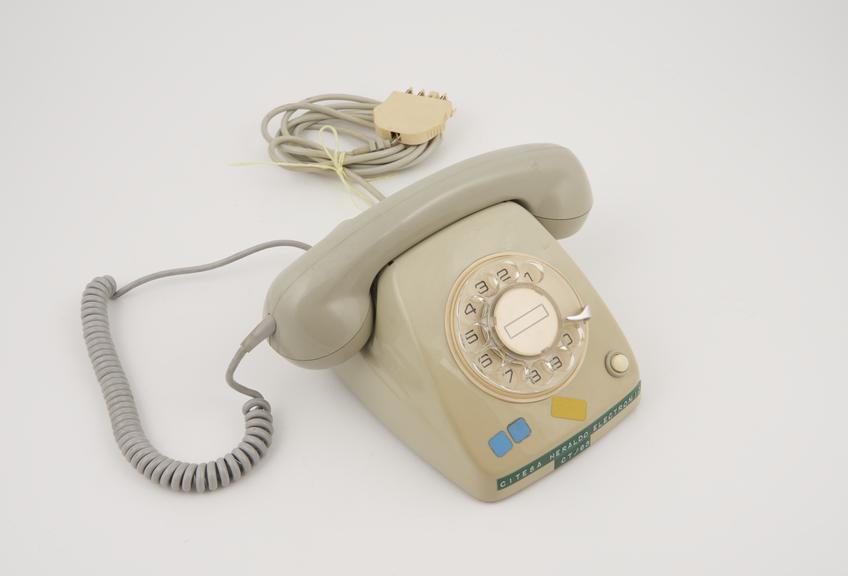 Telephone handset, grey, dial