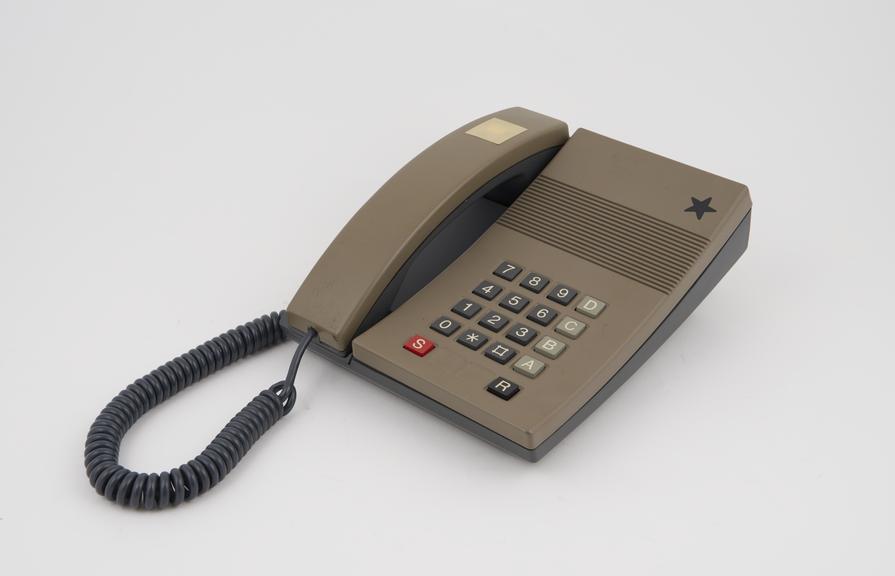 Telephone handset, two-tone light brown and black, push button