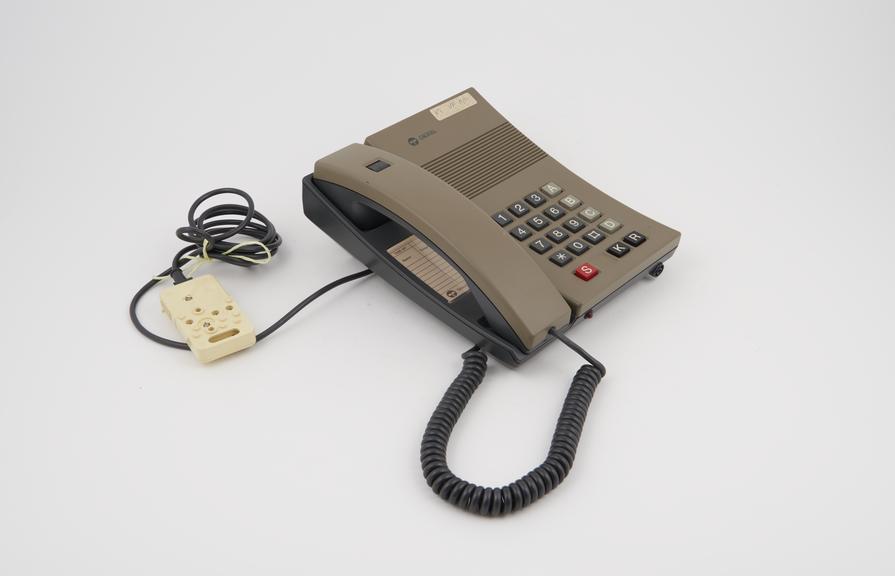 Telephone handset, two-tone light brown and black, push button