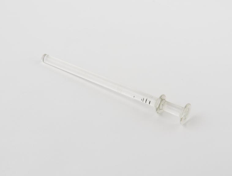 Glass piston rod from a syringe